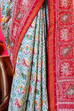 Cream Silk Patola Woven Traditional Saree with Contrast Border and Pallu