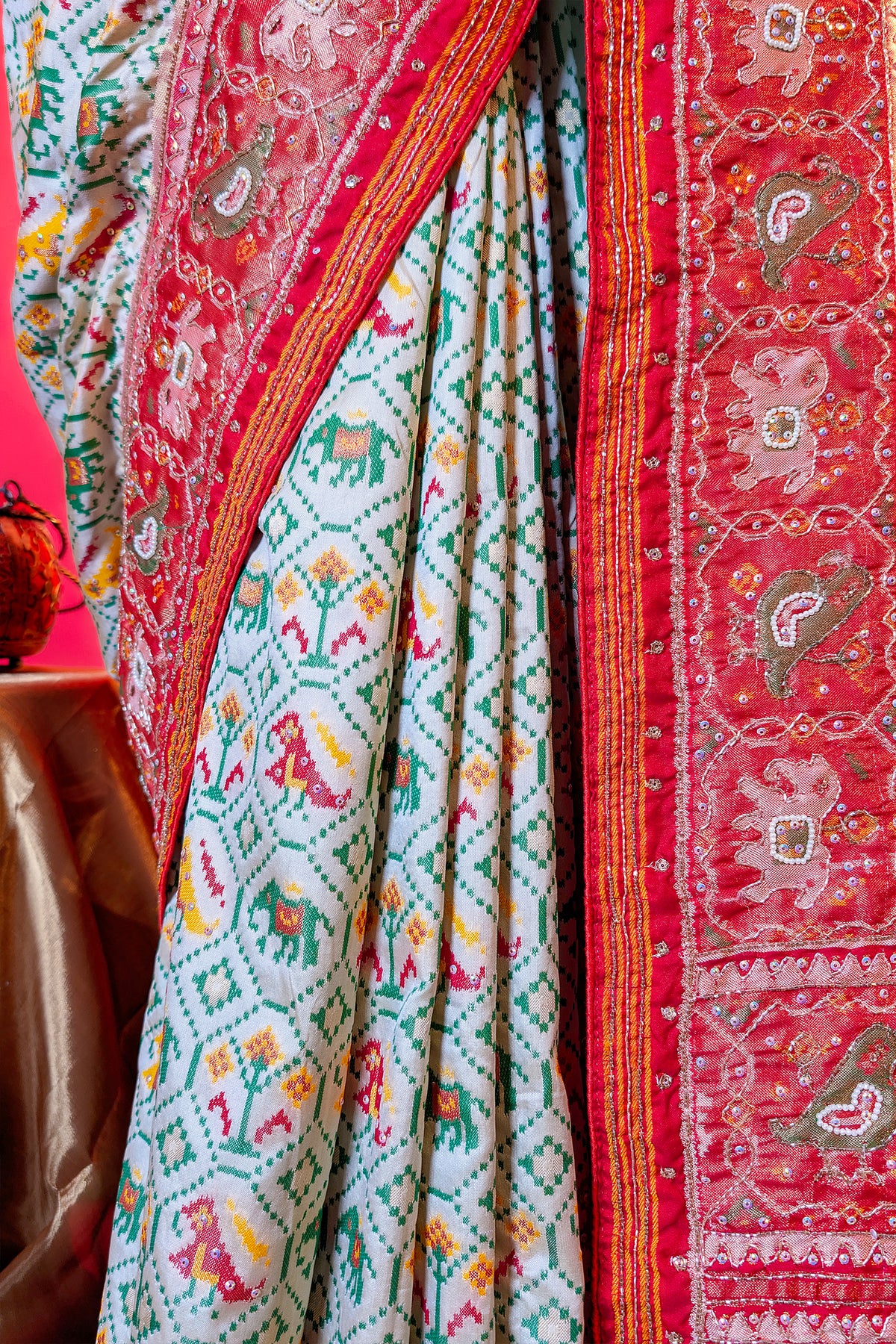 Cream Silk Patola Woven Traditional Saree with Contrast Border and Pallu