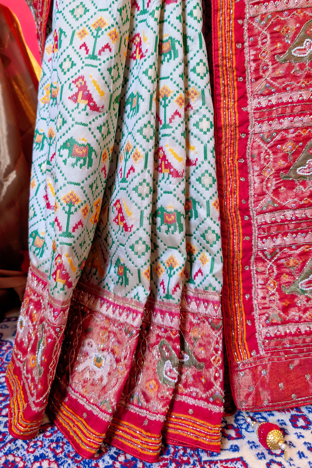 Cream Silk Patola Woven Traditional Saree with Contrast Border and Pallu