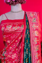 Dark Green Art Silk Patola Saree with Contrast Border and Pallu