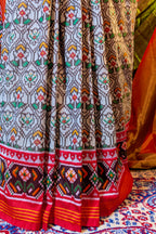 Off White Art Silk Patola Saree with Contrast Border and Pallu