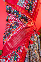 Off White Art Silk Patola Saree with Contrast Border and Pallu