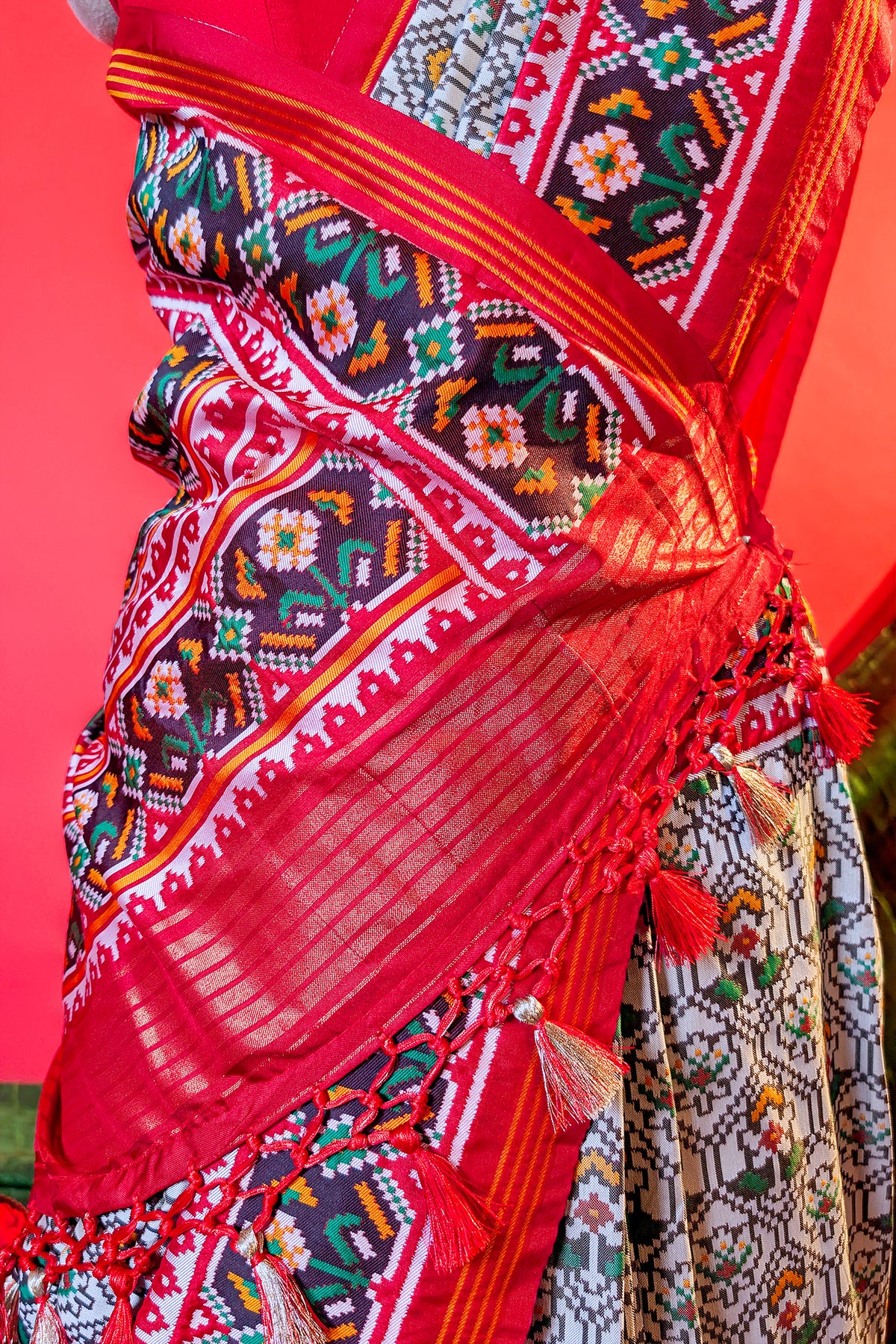 Off White Art Silk Patola Saree with Contrast Border and Pallu