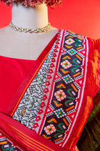 Off White Art Silk Patola Saree with Contrast Border and Pallu