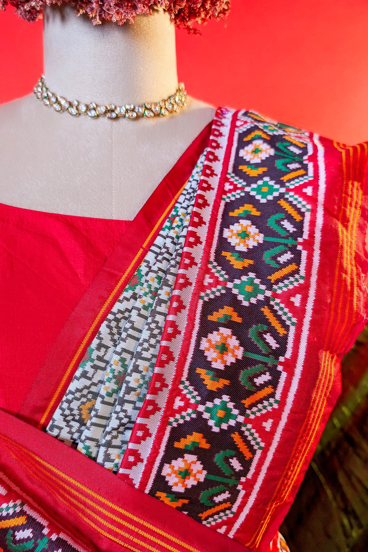 Off White Art Silk Patola Saree with Contrast Border and Pallu