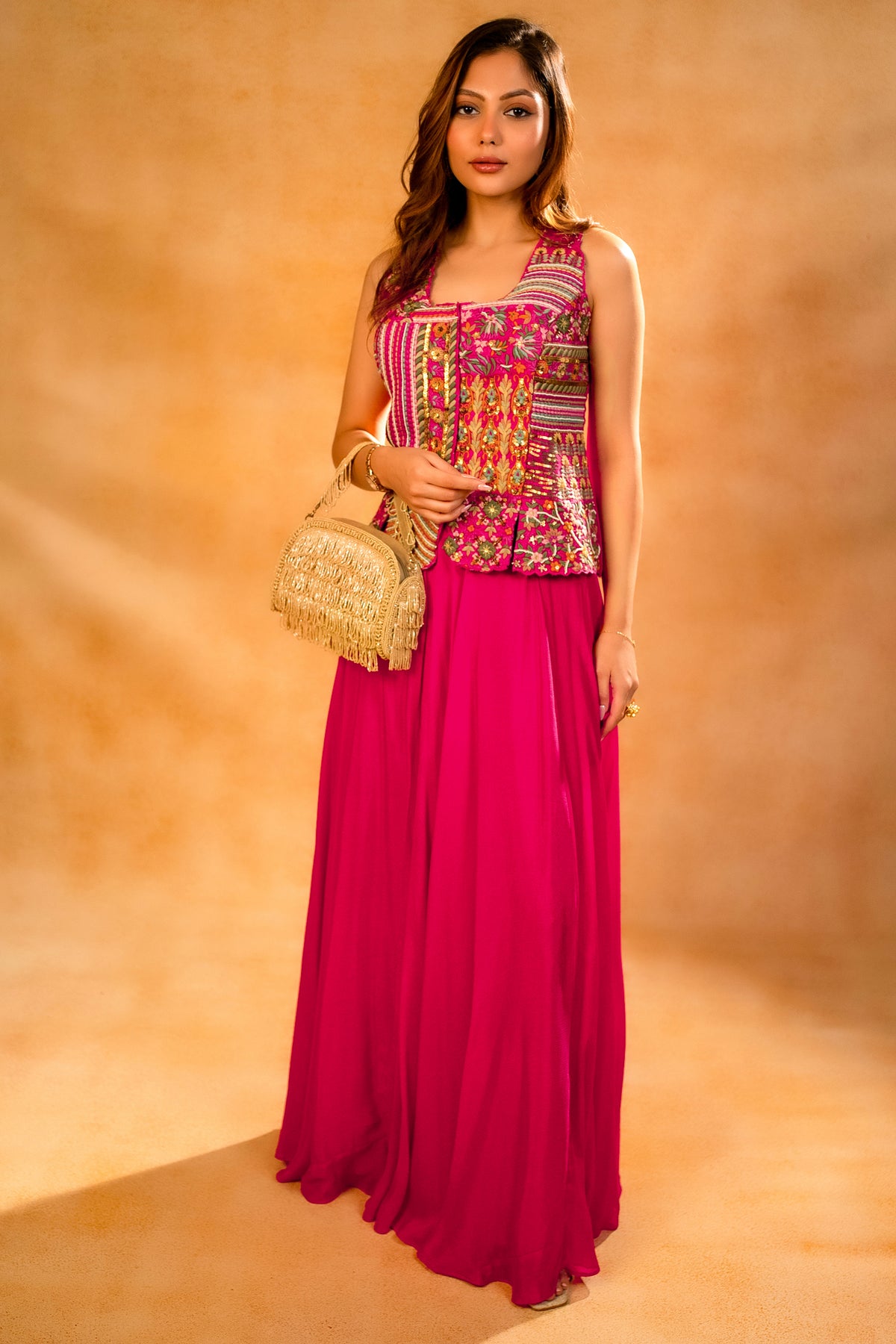 Close-up of multi-colored thread embroidery and fine cutdana on the Fuschia Pink Silk Embroidered Top and Palazzo Set