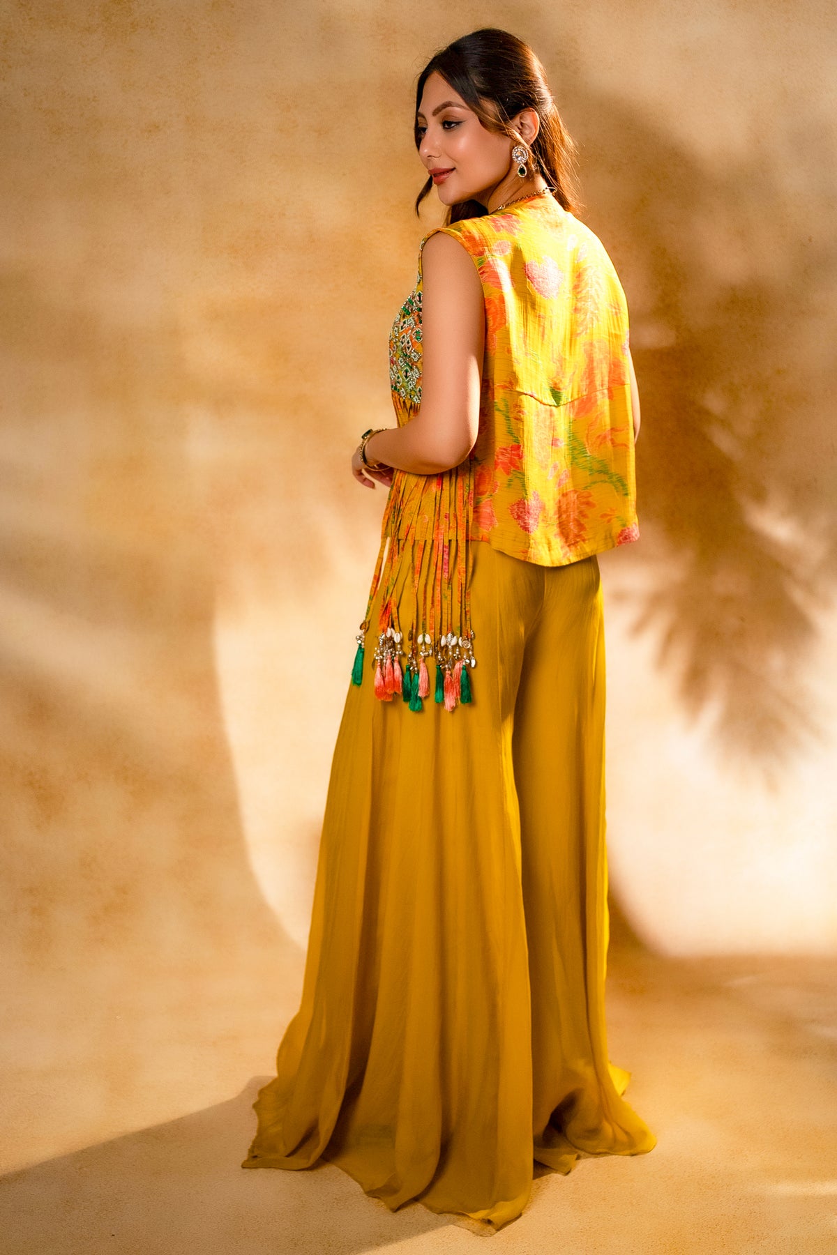 Yellow Organza Crop Top Palazzo Set with Jacket showcasing playful shell and metallic coin tassels