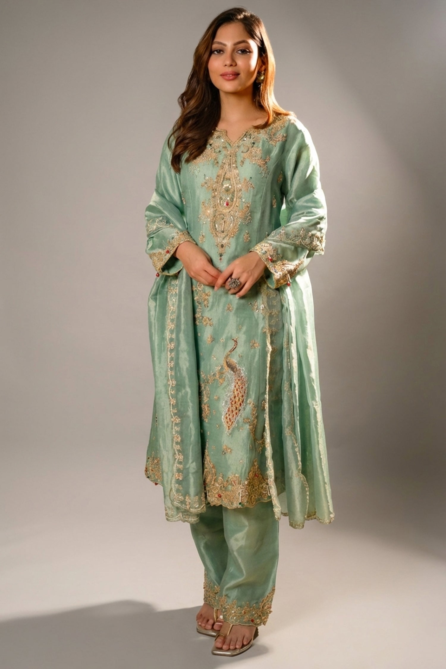 Turquoise Blue Organza Designer Handworked Suit - Front View Main image