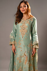 Close-up of traditional Zardosi and shimmering sequins on the Turquoise Blue Organza Designer Handworked Suit