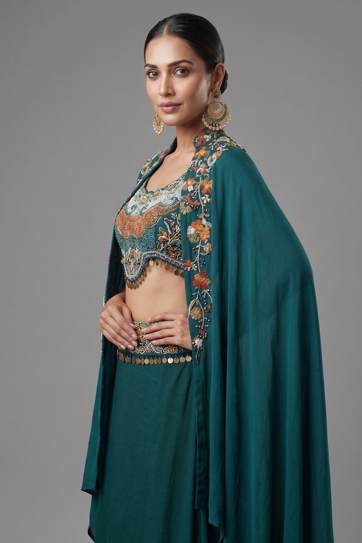 Close-up of tonal beads and sequins on the Bottle Green Crepe Satin Silk Skirt Set with Jacket