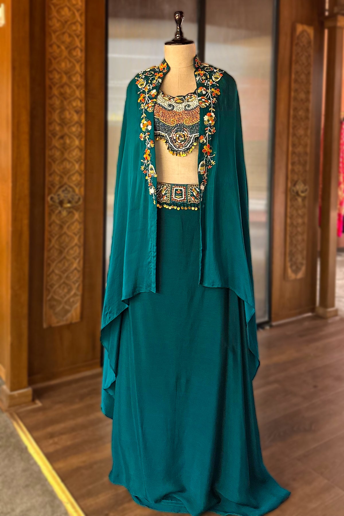 Bottle Green Crepe Satin Silk Skirt Set with Jacket featuring a high-fashion layered look