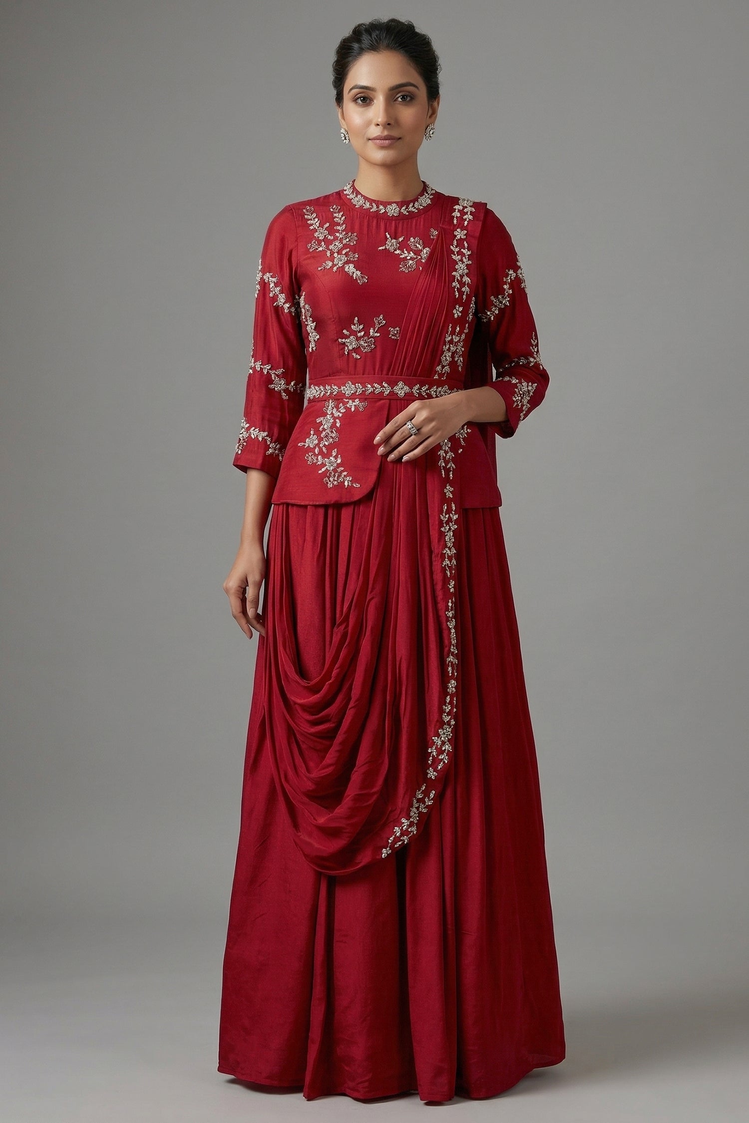 Red embroidered dress with a draped design