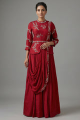 Red embroidered dress with a draped design