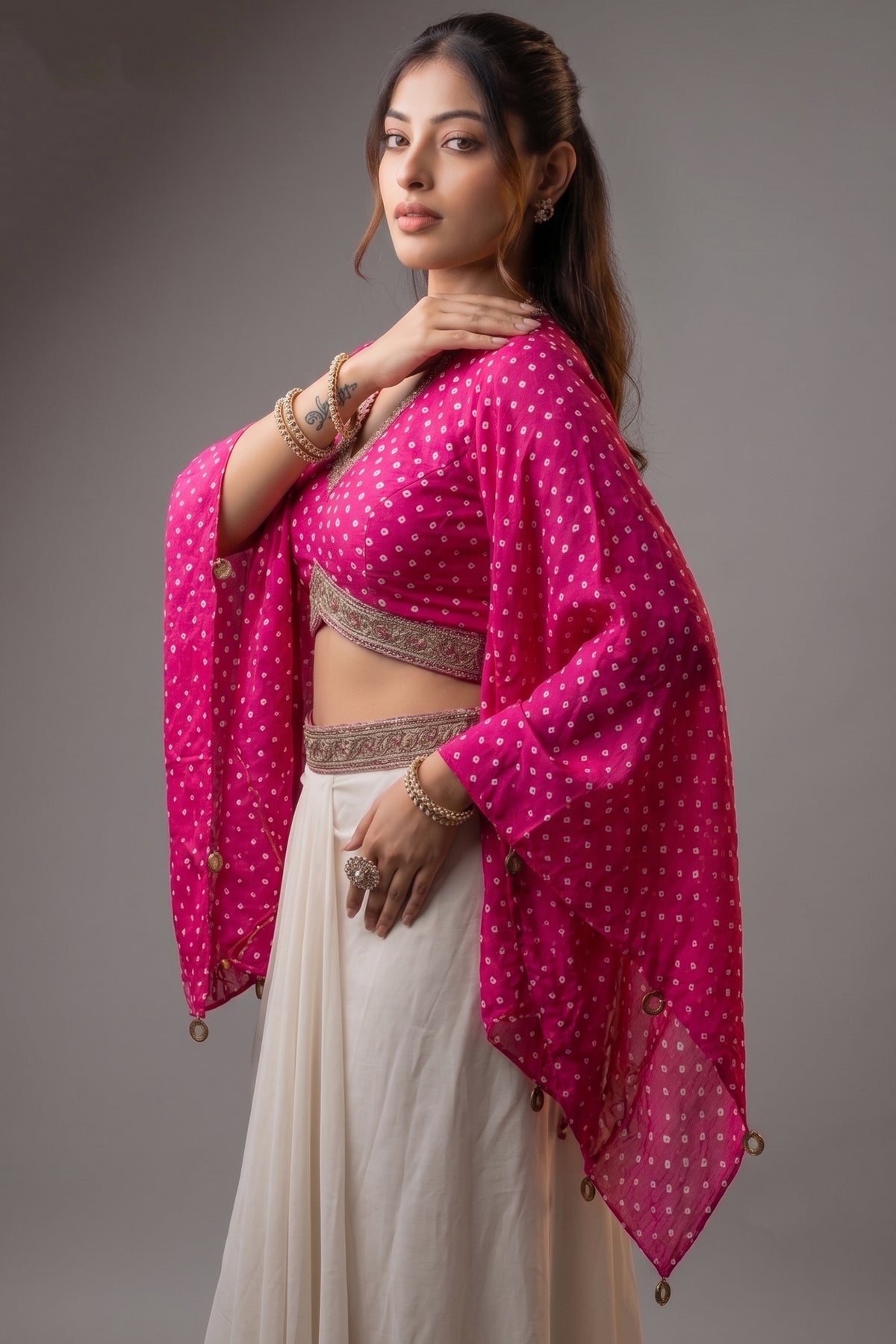 Rani Pink Gaji Silk Bandhej Printed Crop Top with Draped Skirt Set