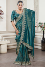 Peacock Blue Tissue Dola Silk Solid Saree with Readymade Blouse and Beaded and Zardosi Worked Border - blue silk saree