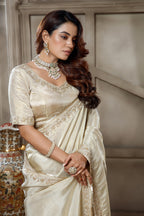 Ivory White Tissue Dola Silk Solid Saree with Readymade Blouse and Beaded Work Border - white silk saree