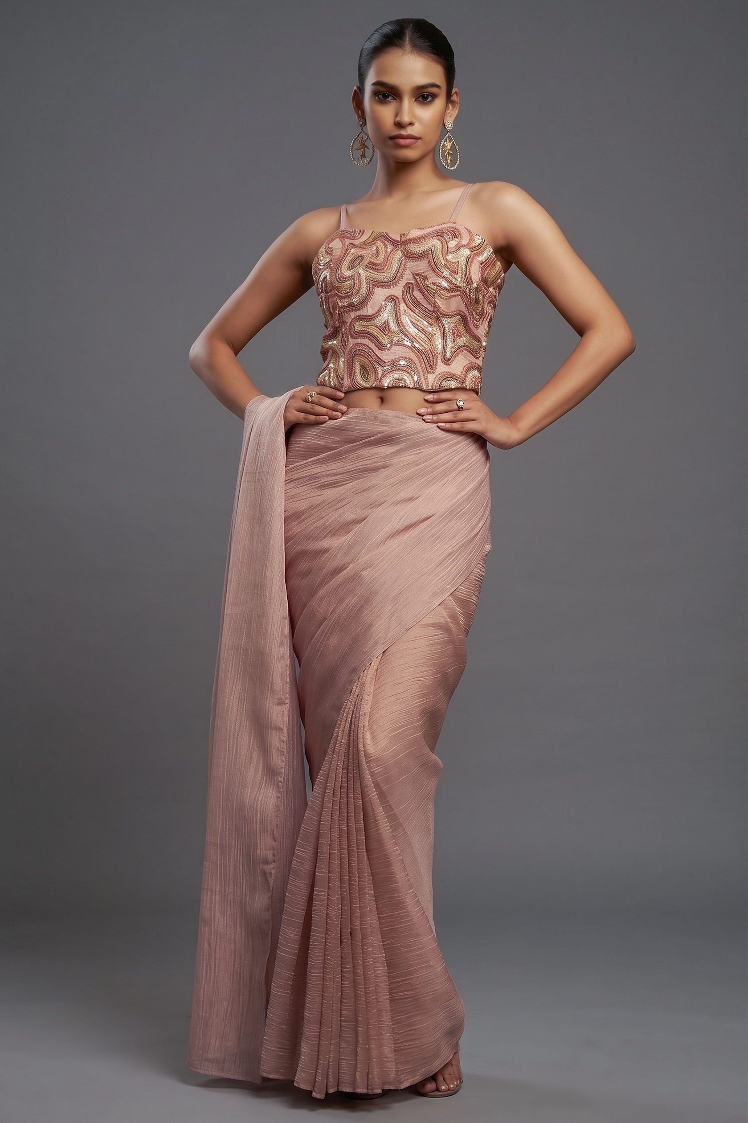 Peach Crushed Metallic Saree with Sequin-Embellished Corset Blouse Main image