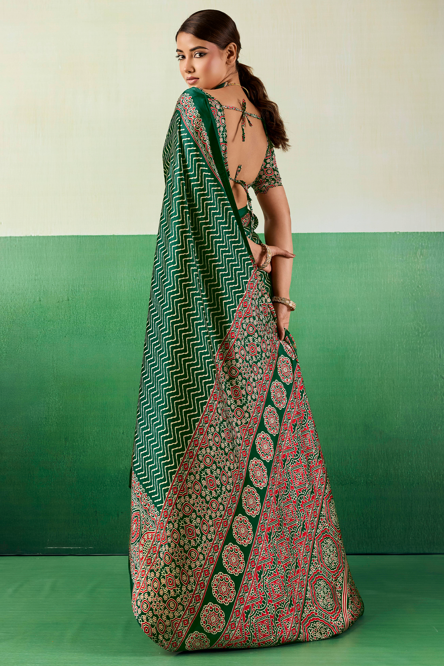 Bottle Green Satin Ajrakh Print Saree with Chevron Body and Detailed Pallu Border