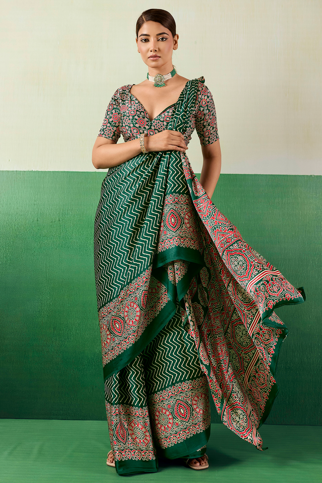 Bottle Green Satin Ajrakh Print Saree with Chevron Body and Detailed Pallu Border