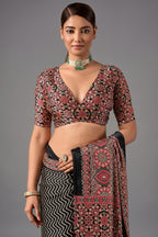 Charcoal Black Satin Ajrakh Print Saree with Chevron Body and Detailed Pallu Border