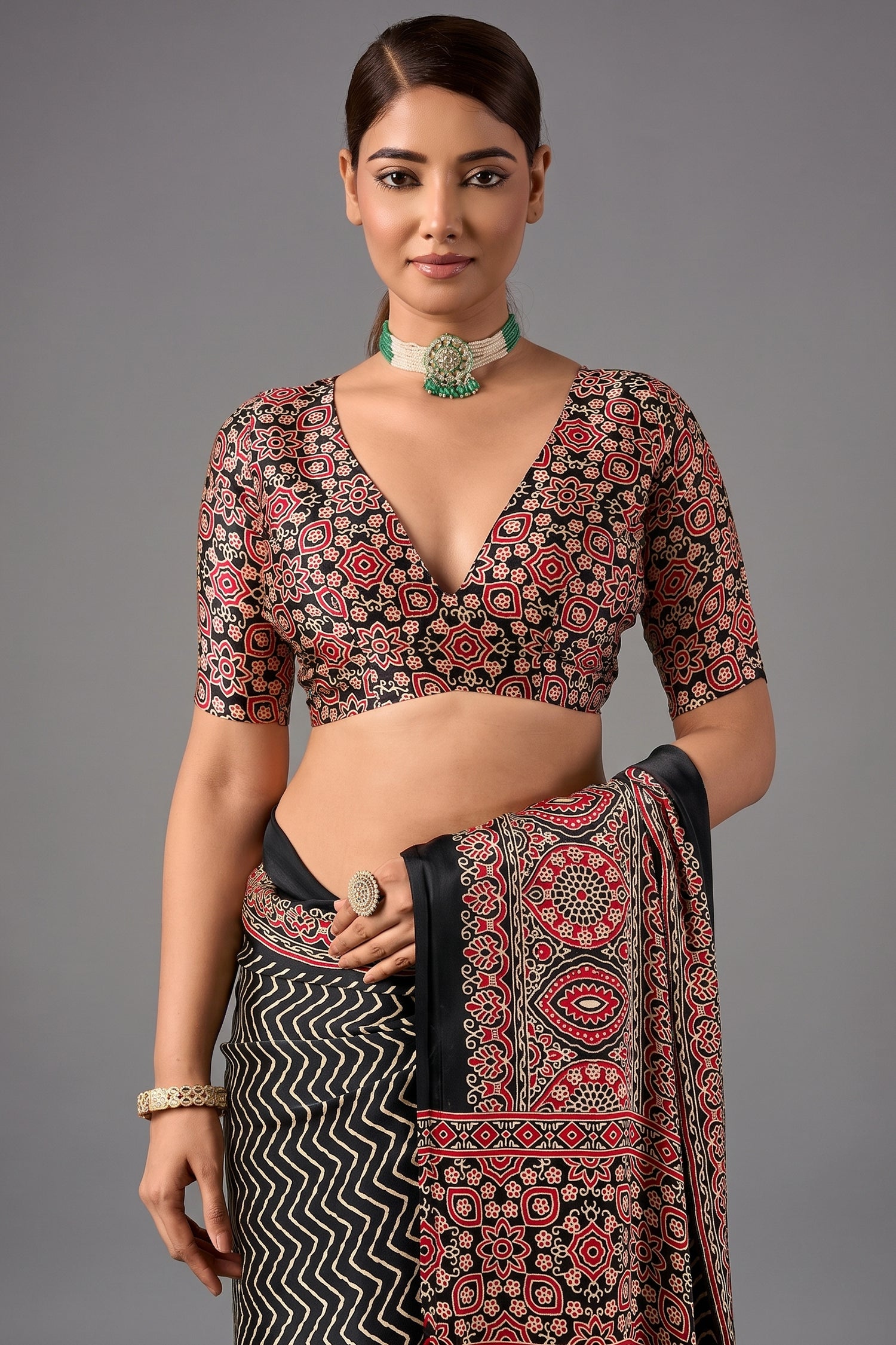 Charcoal Black Satin Ajrakh Print Saree with Chevron Body and Detailed Pallu Border