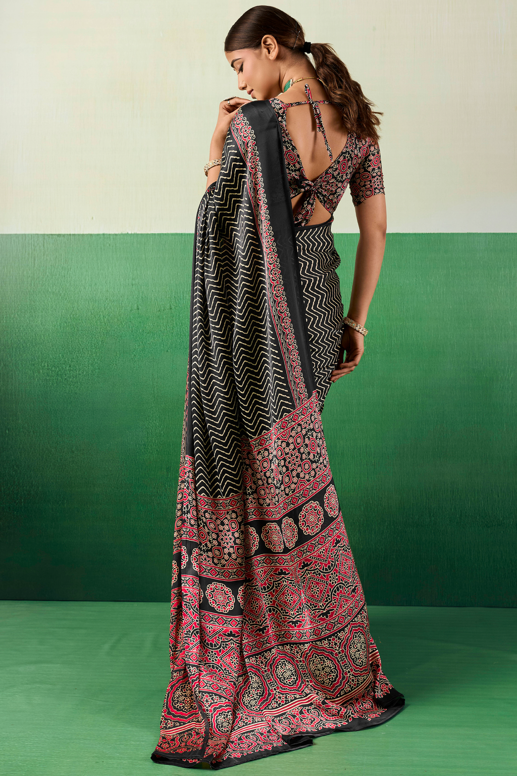 Charcoal Black Satin Ajrakh Print Saree with Chevron Body and Detailed Pallu Border