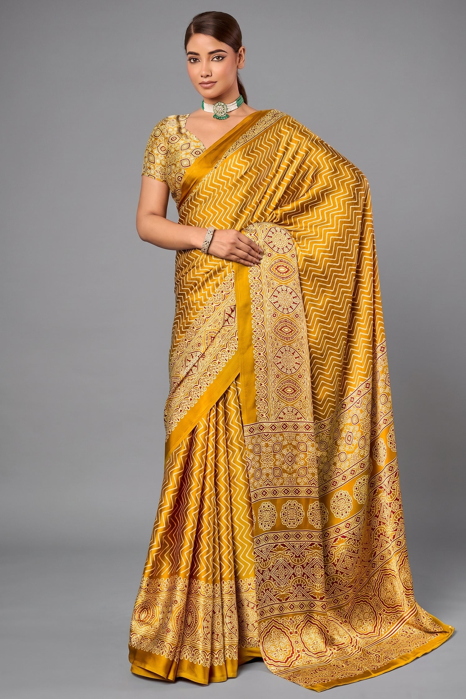 Honey Gold Satin Ajrakh Print Saree with Chevron Body and Detailed Pallu Border