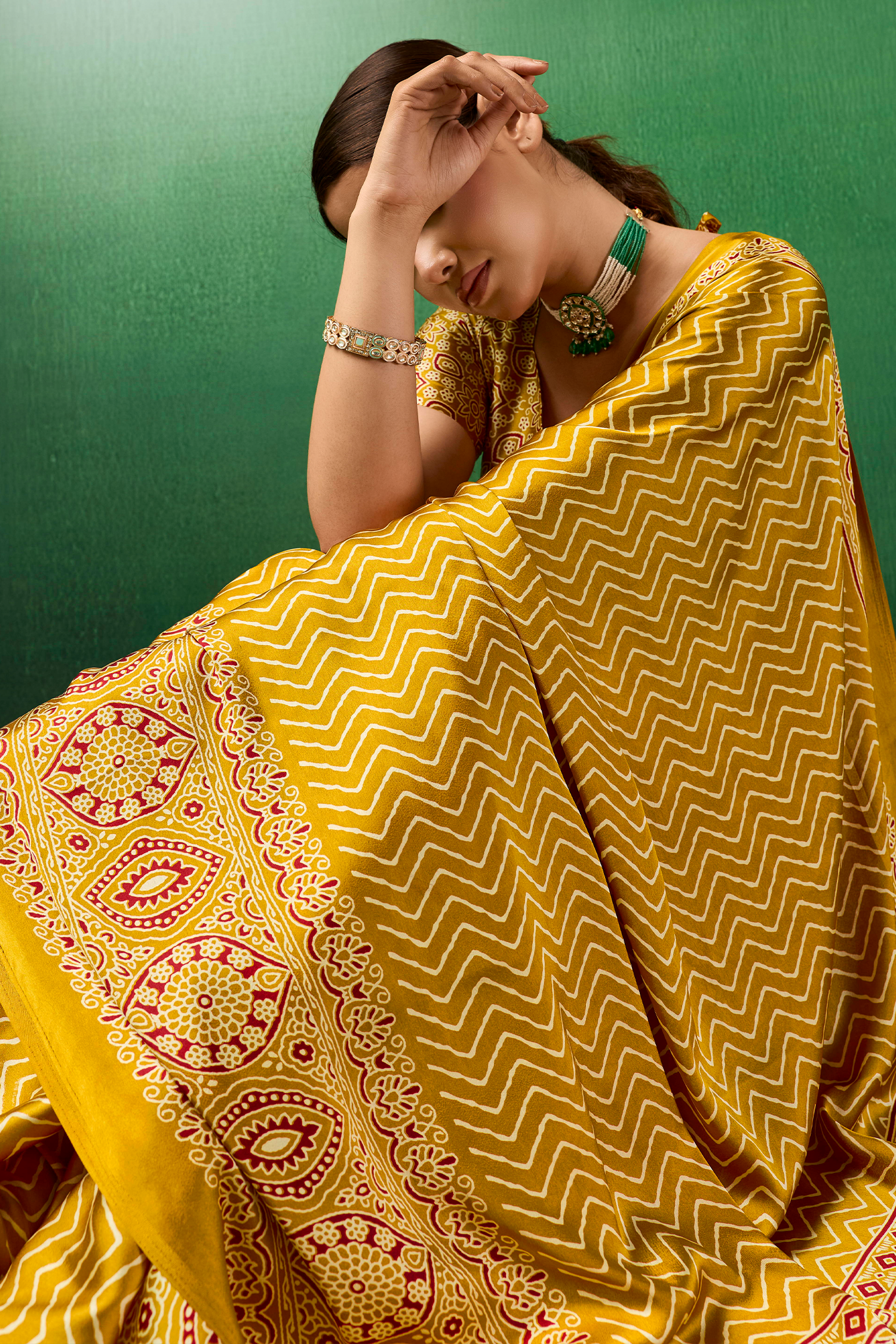 Honey Gold Satin Ajrakh Print Saree with Chevron Body and Detailed Pallu Border