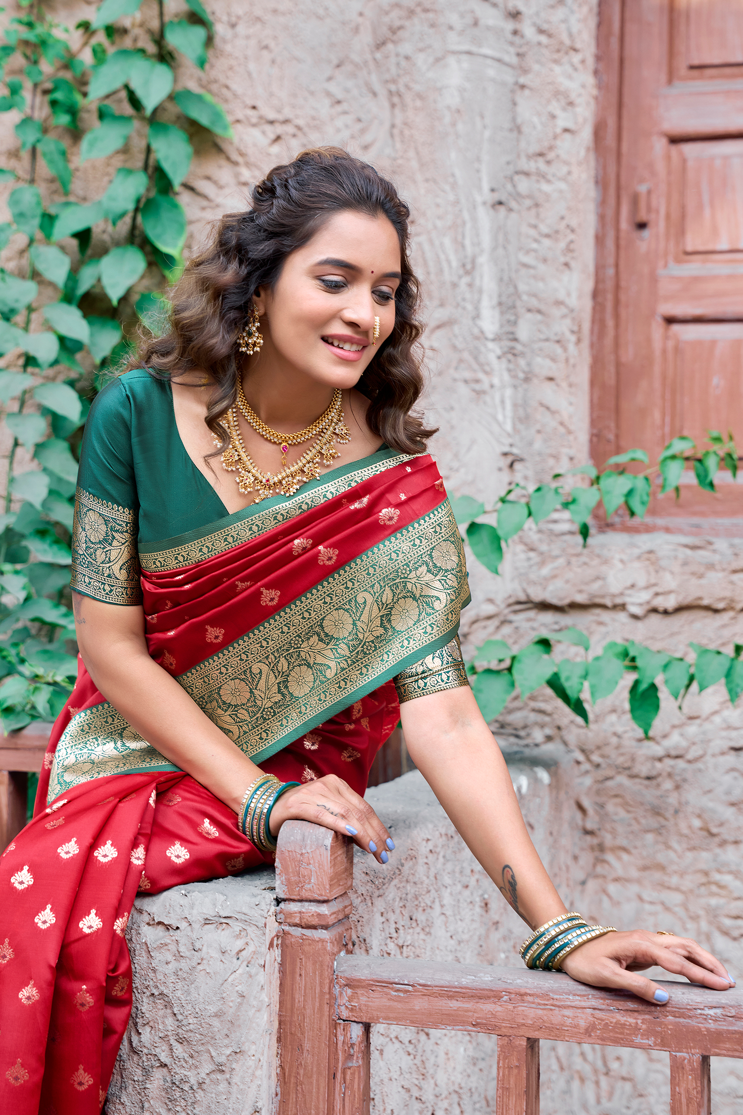 Crimson Red Art Silk All Over Zari Weaving Saree with Contrast Green Border
