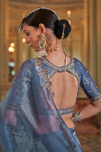 Periwinkle Blue Tissue Saree with Floral Embroidery and Scalloped Border