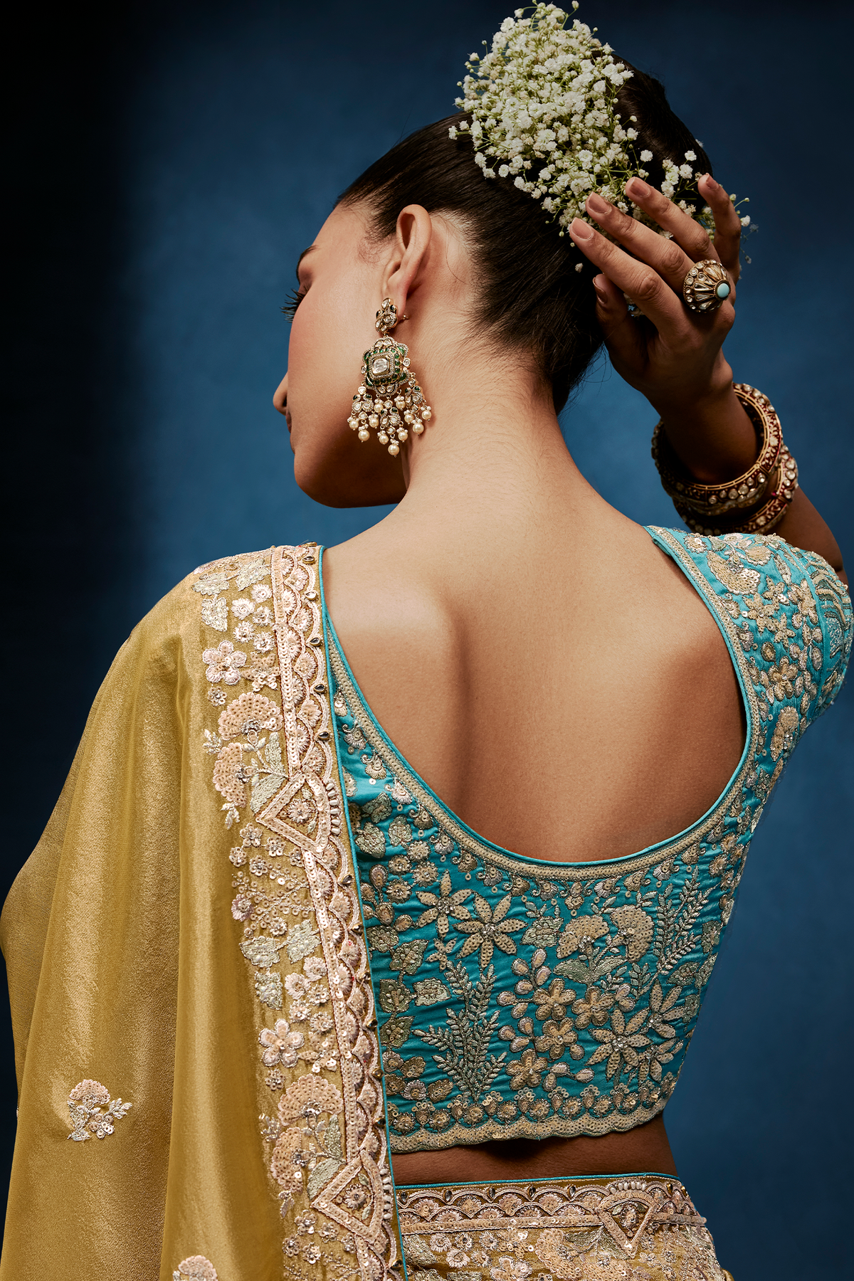Mustard Gold Saree With Contrasting Turquoise Blue Embroidered Blouse In Cutdana Work