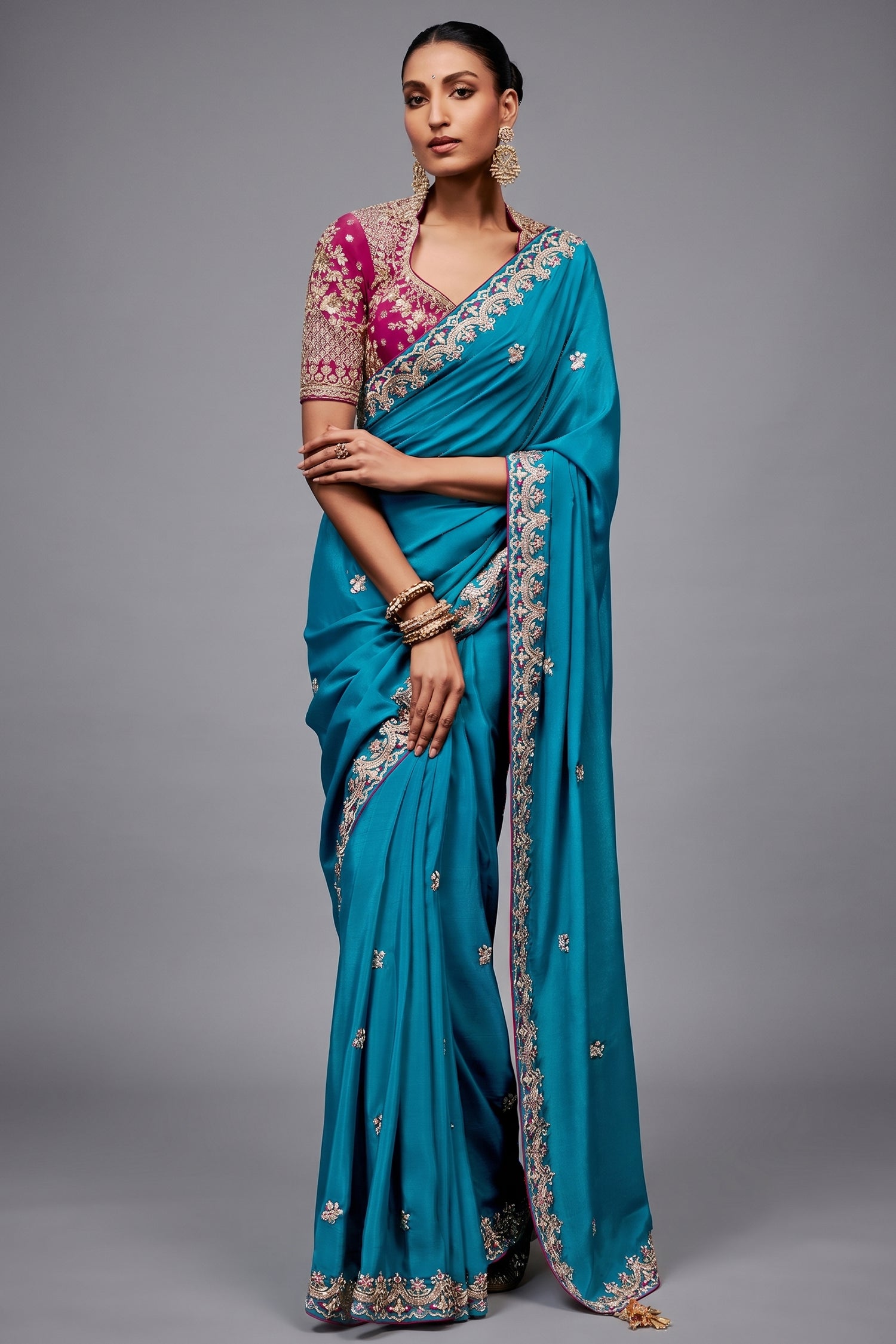 Teal Blue Saree with Magenta Contrasting Embroidered Blouse Main image