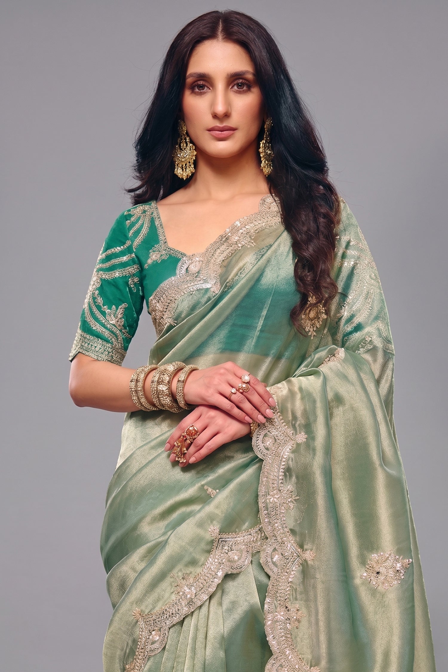 Mint Green Saree In Scallop Border with Featuring Intricate Sequin Work