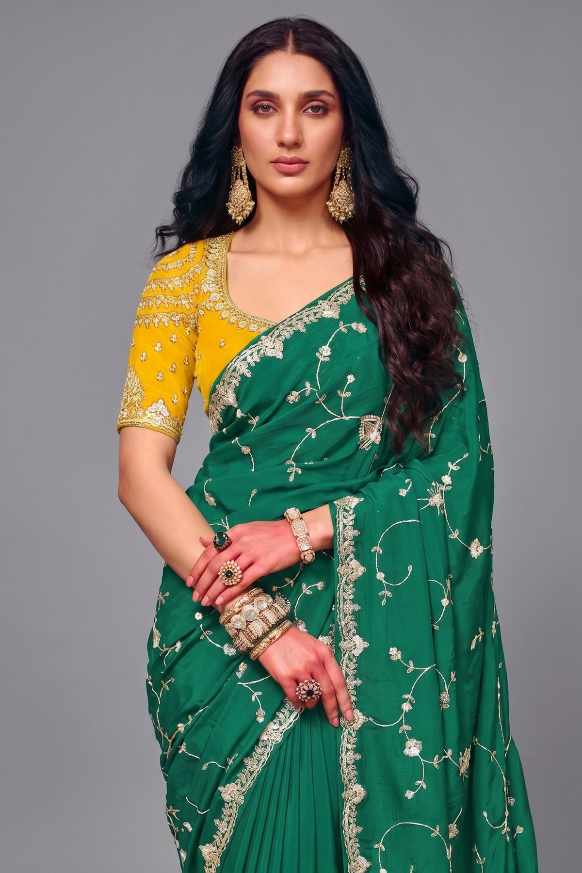 Emerald Green Satin Silk Saree With Heavy Sequin Work And Contrasting Yellow Blouse
