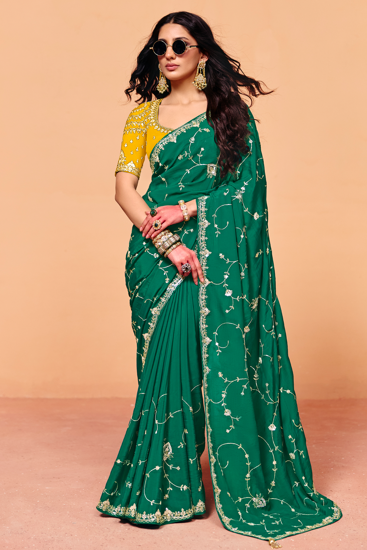 Emerald Green Satin Silk Saree With Heavy Sequin Work And Contrasting Yellow Blouse