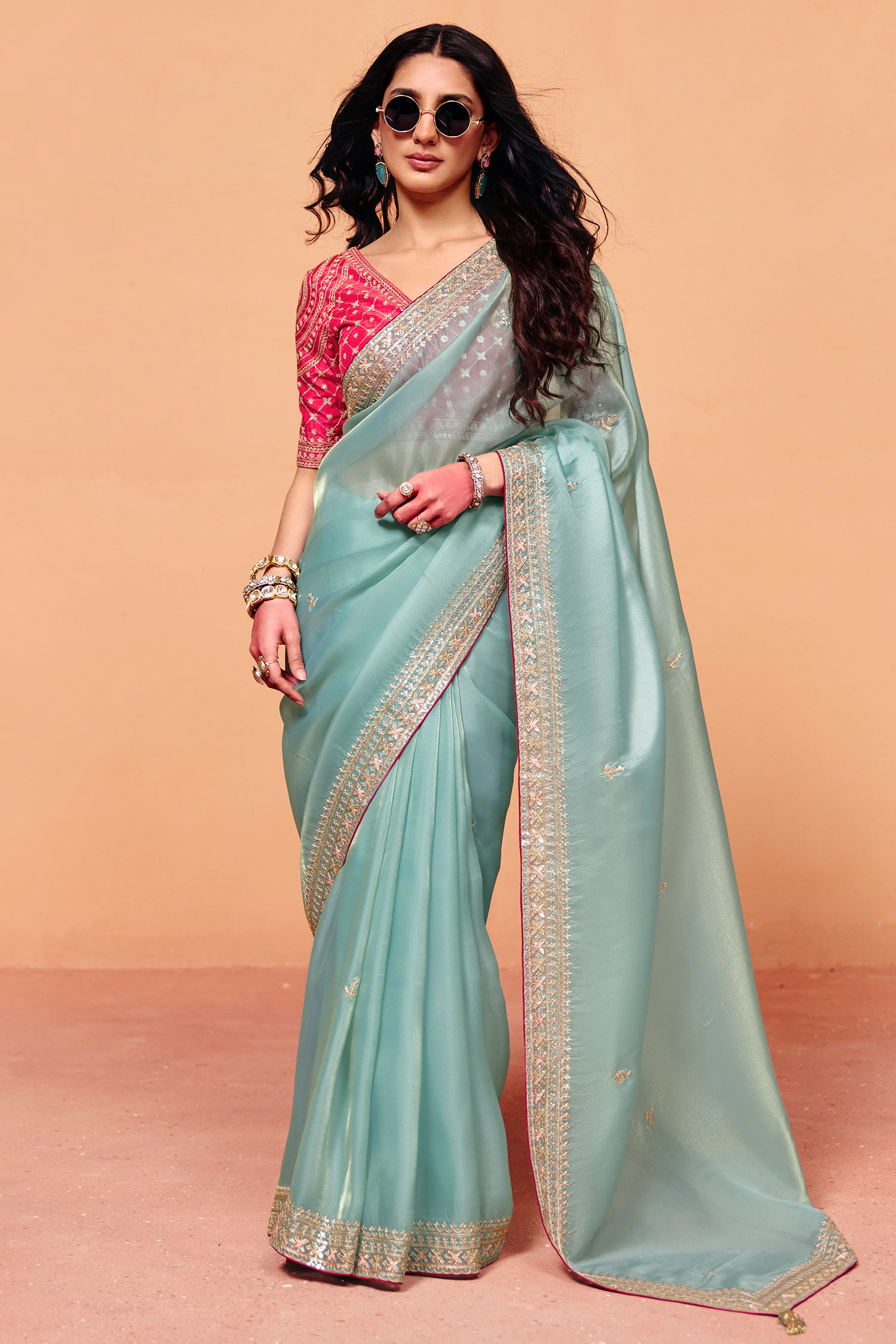 Ice Blue Organza Saree Featuring Heavy Sequin Embroidery