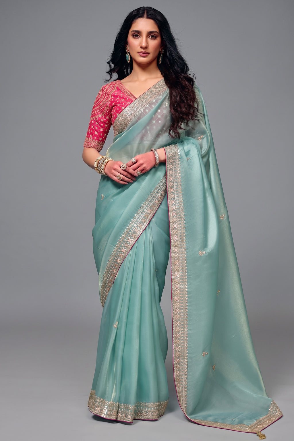 Ice Blue Organza Saree Featuring Heavy Sequin Embroidery