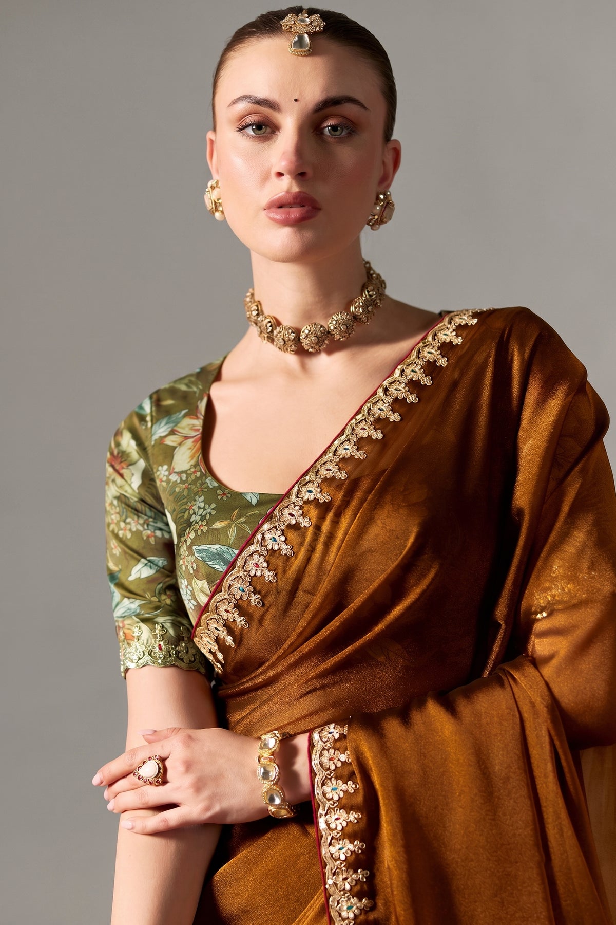 Rich Bronze Brown Tissue Saree Showcasing Embroidery