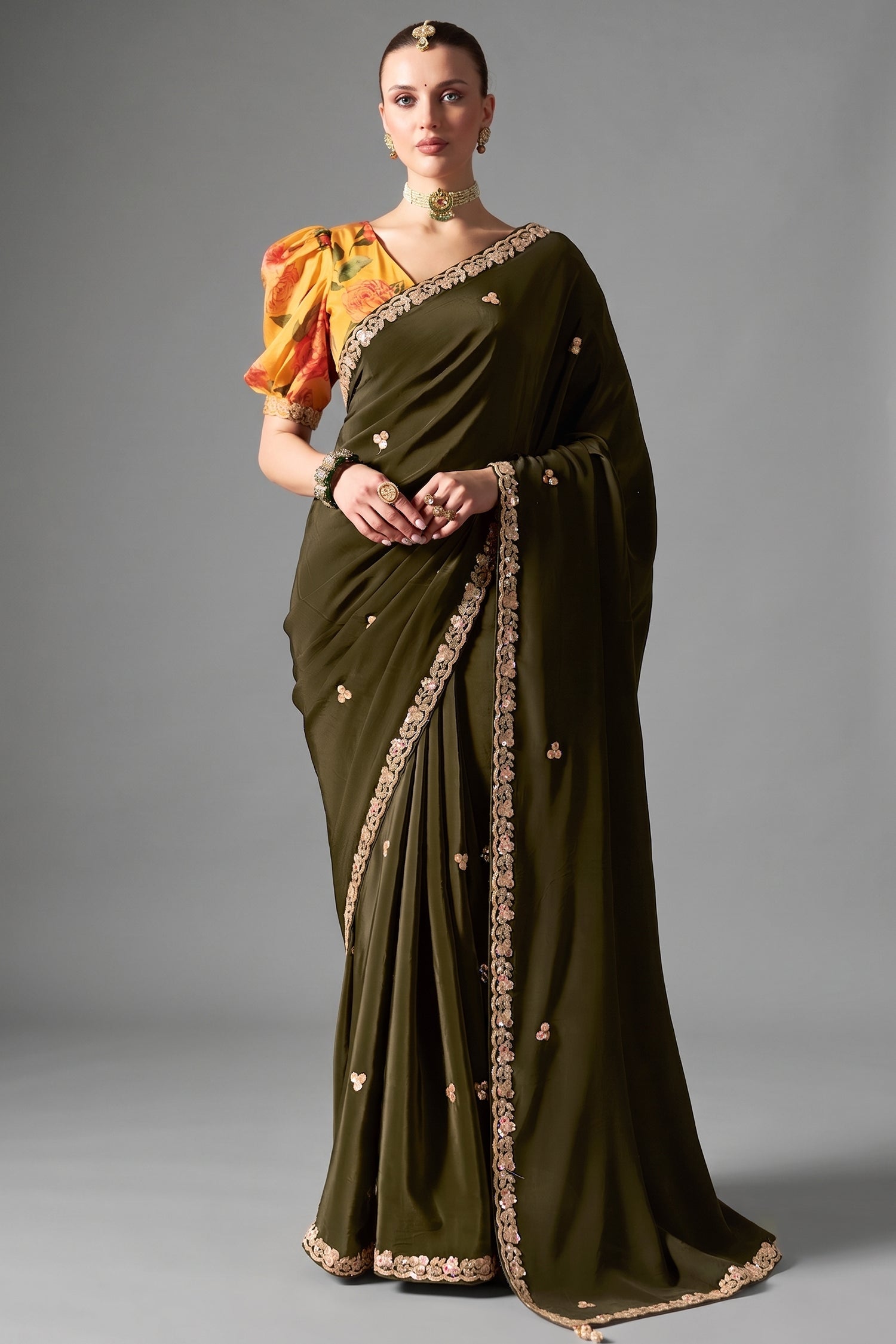 Deep Olive Green Organza Saree Highlighted With Sequins Main image