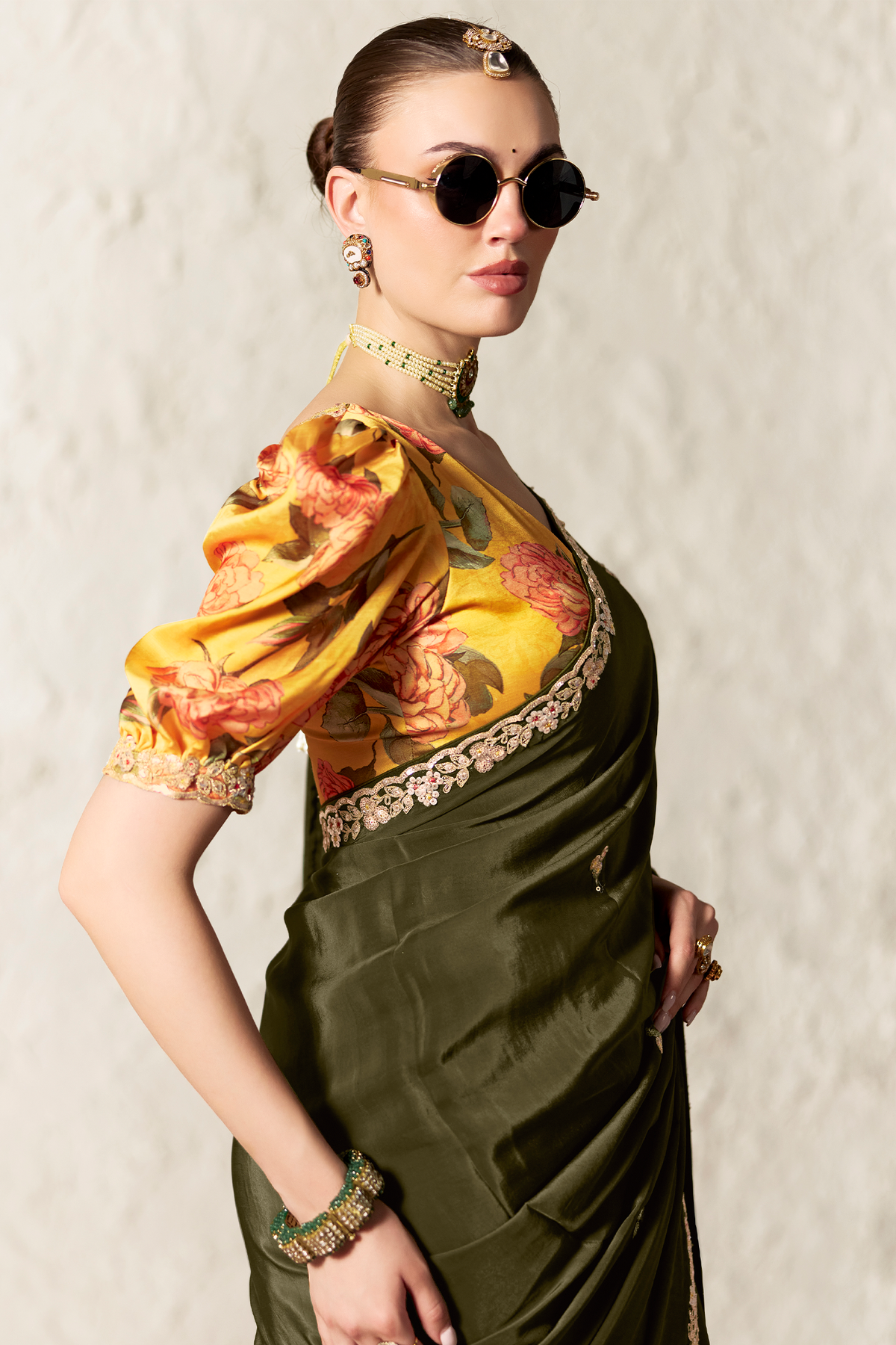 Deep Olive Green Organza Saree Highlighted With Sequins