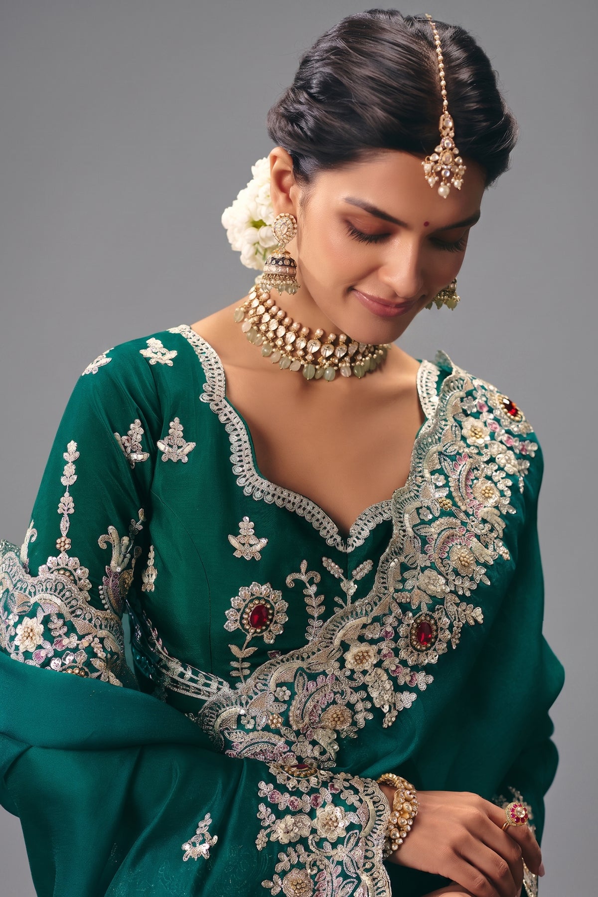 Emerald Green Silk Georgette Saree Adorned with Embroidery