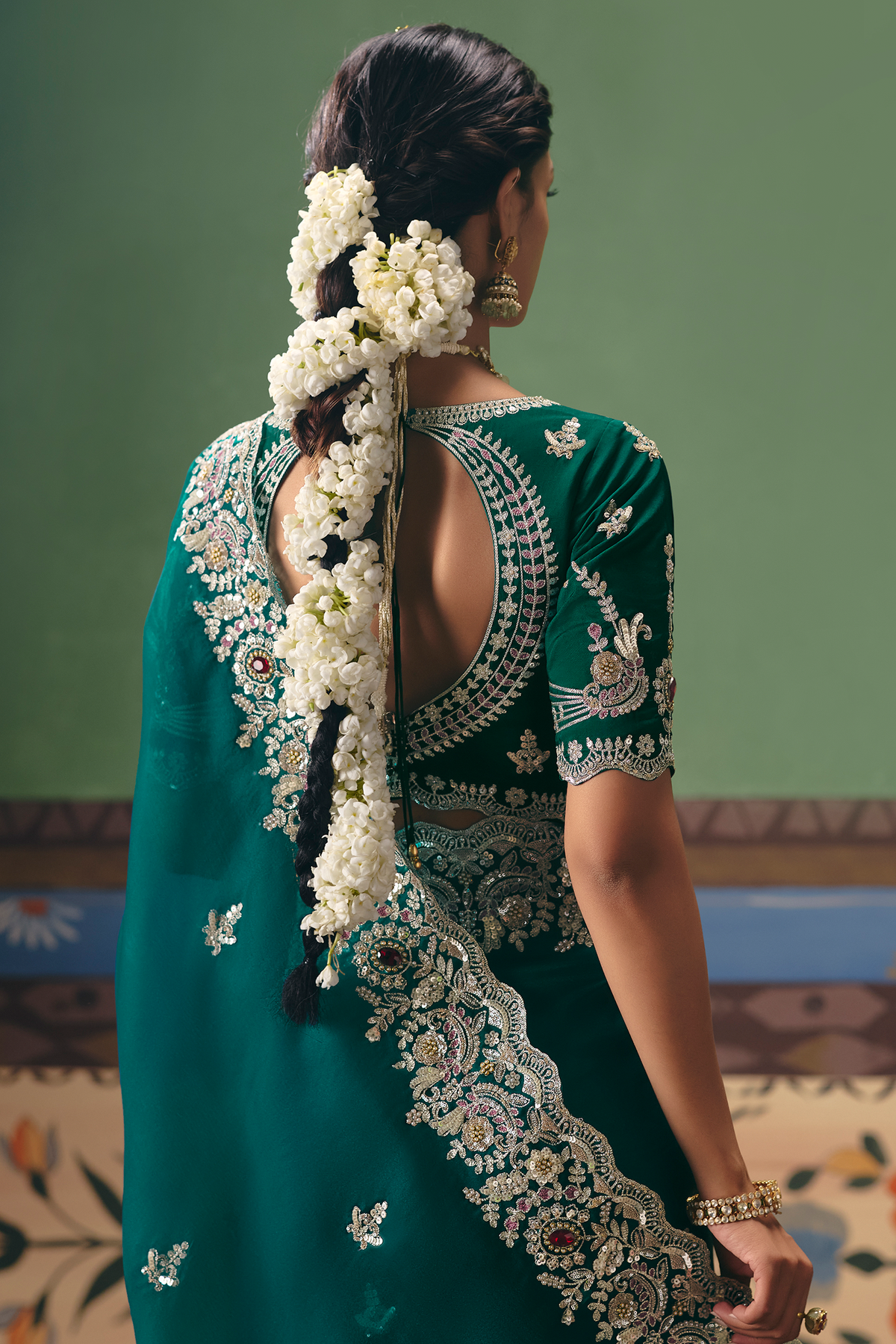 Emerald Green Silk Georgette Saree Adorned with Embroidery