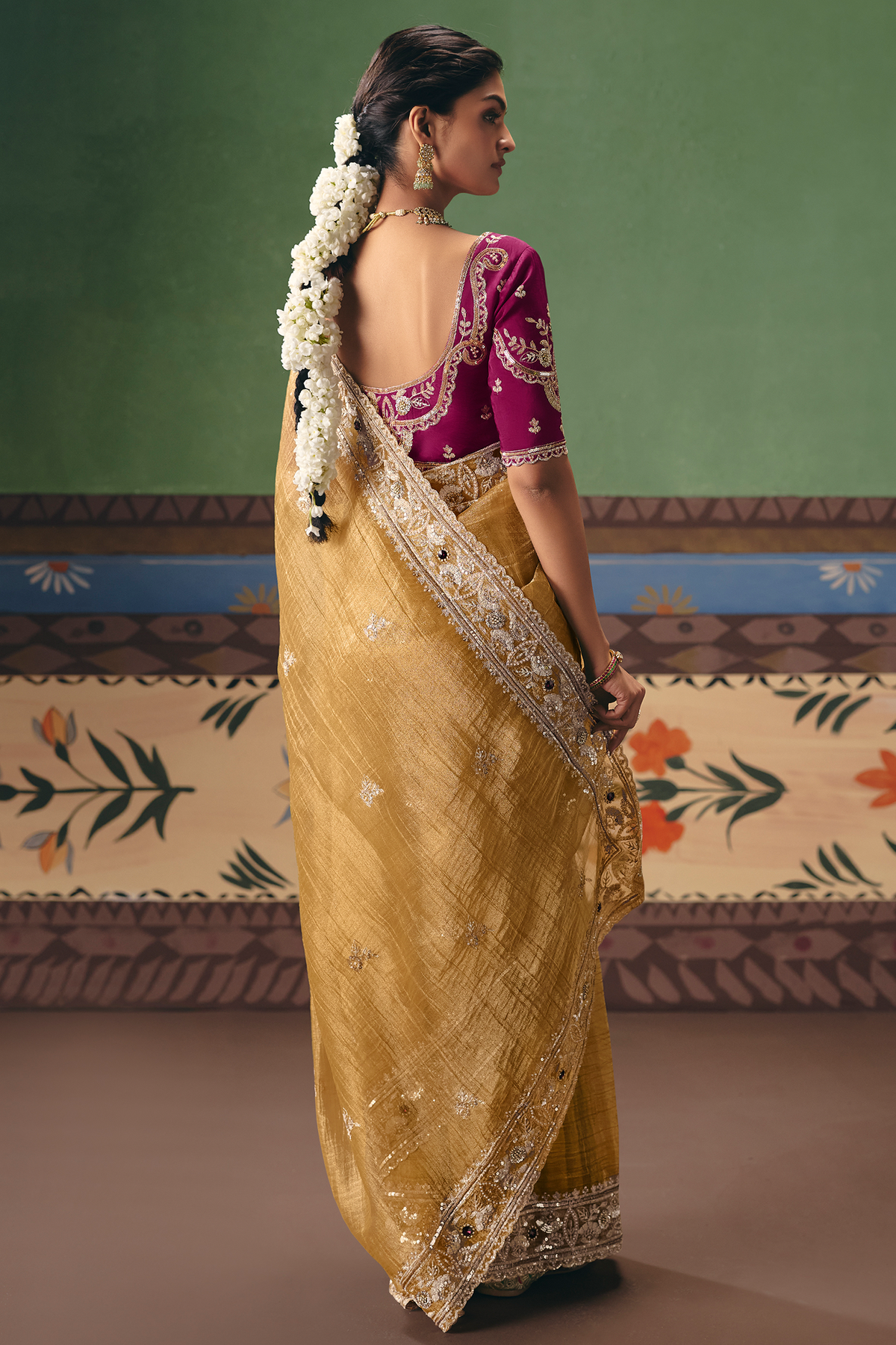 Honey Mustard Organza Saree Showcasing Heavy Border Work