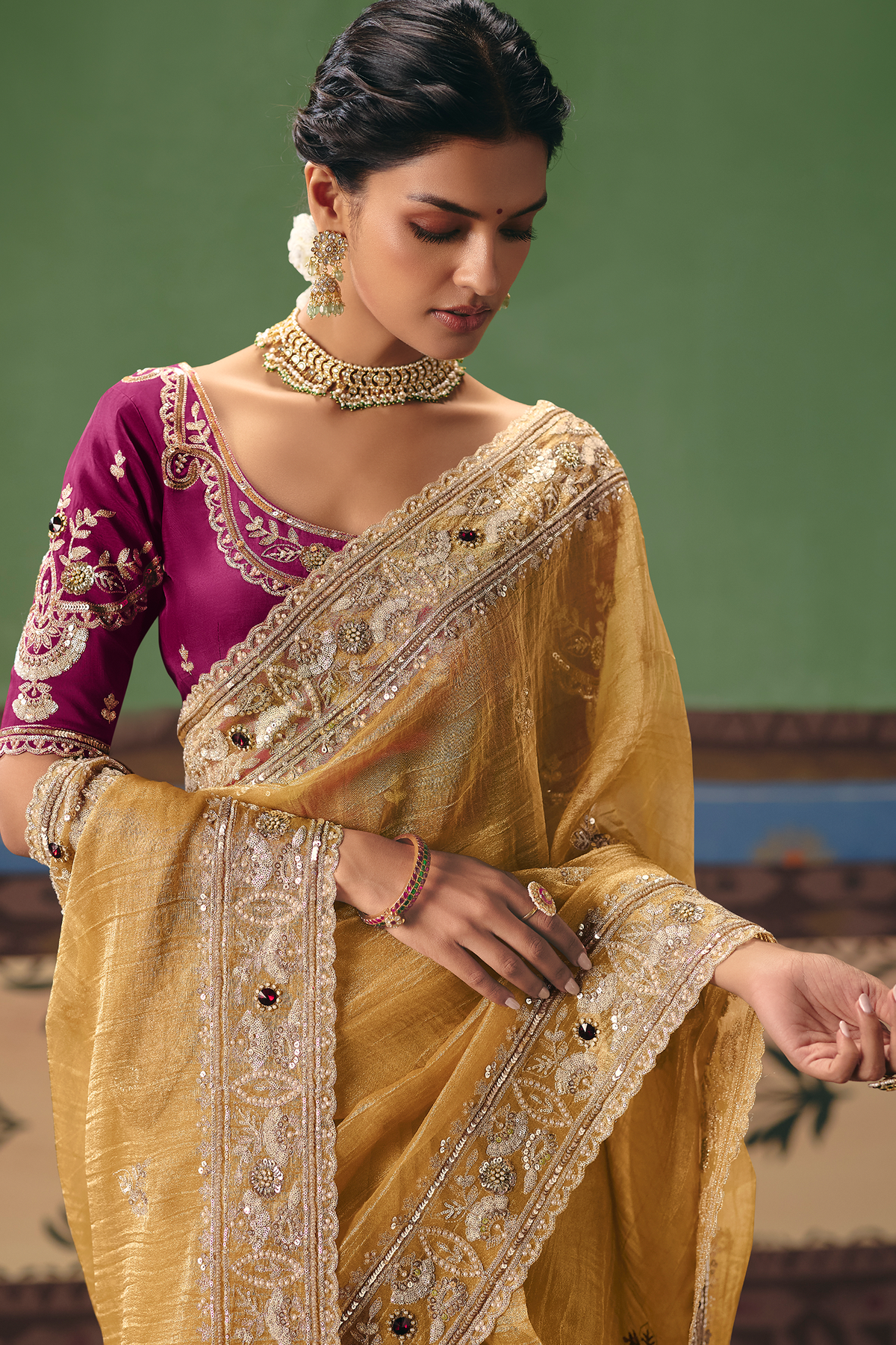 Honey Mustard Organza Saree Showcasing Heavy Border Work