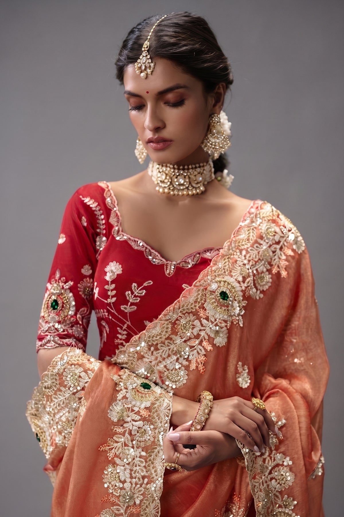 Rust Salmon Saree Highlighting Rich Floral Border Work