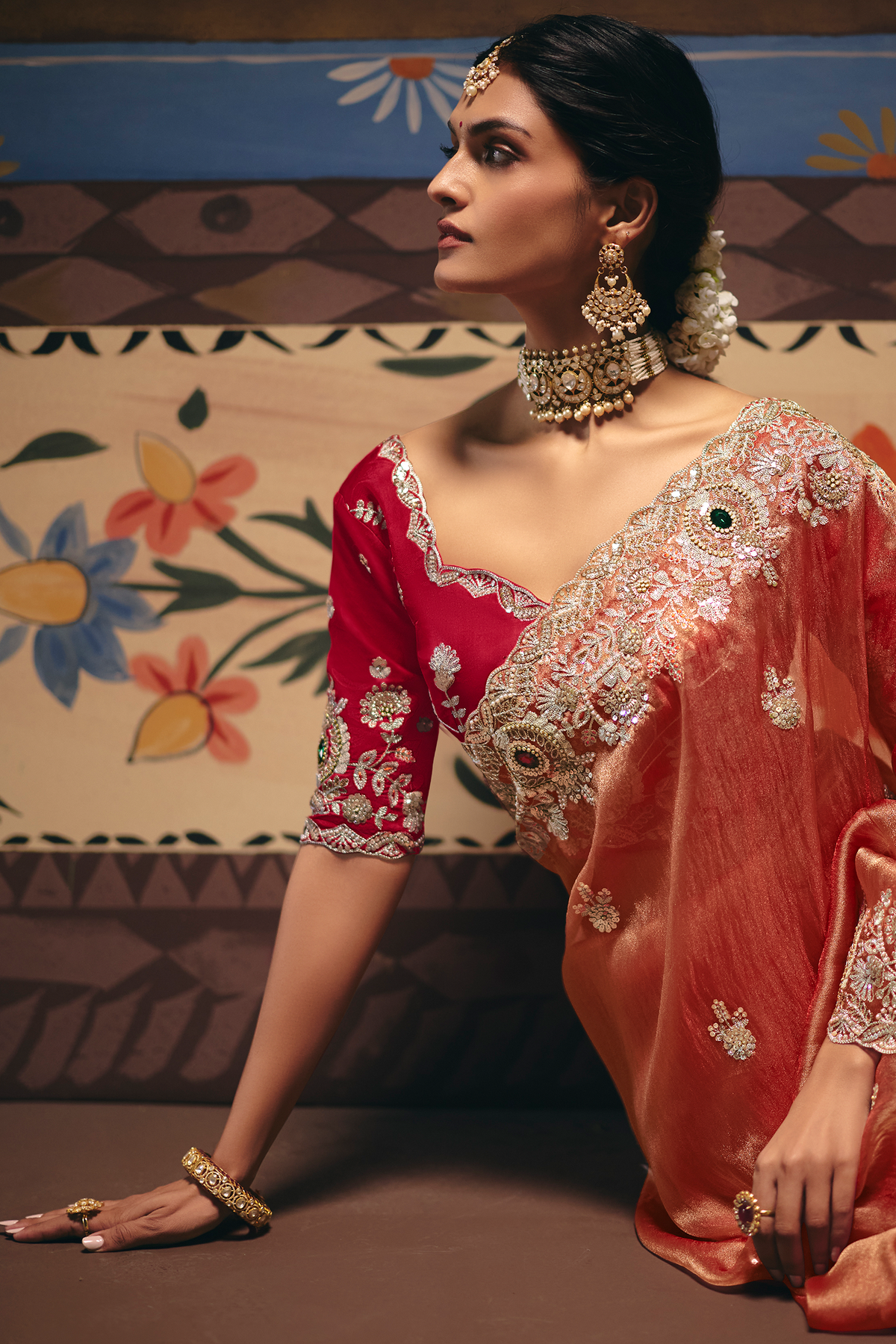 Rust Salmon Saree Highlighting Rich Floral Border Work