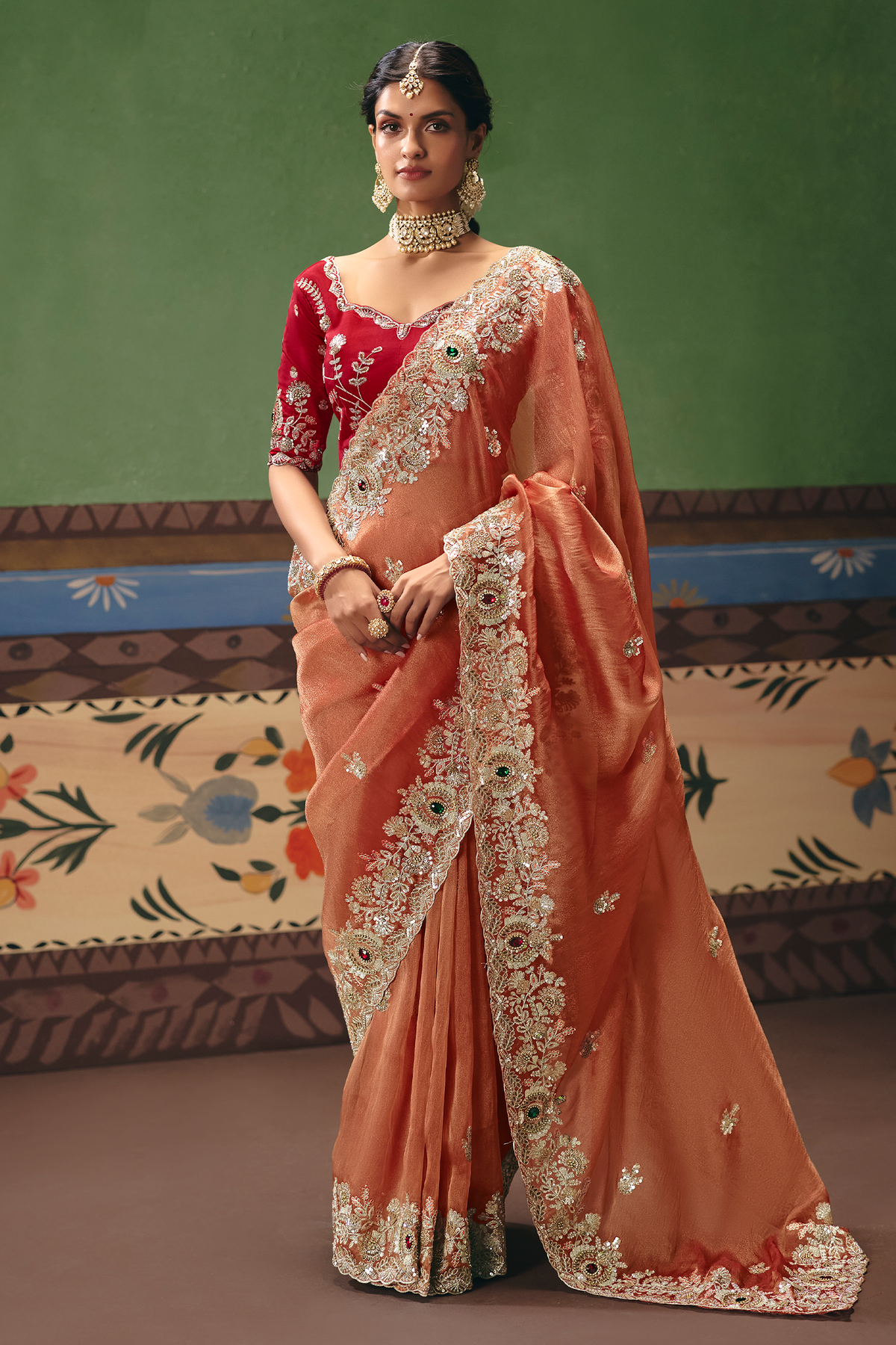 Rust Salmon Saree Highlighting Rich Floral Border Work