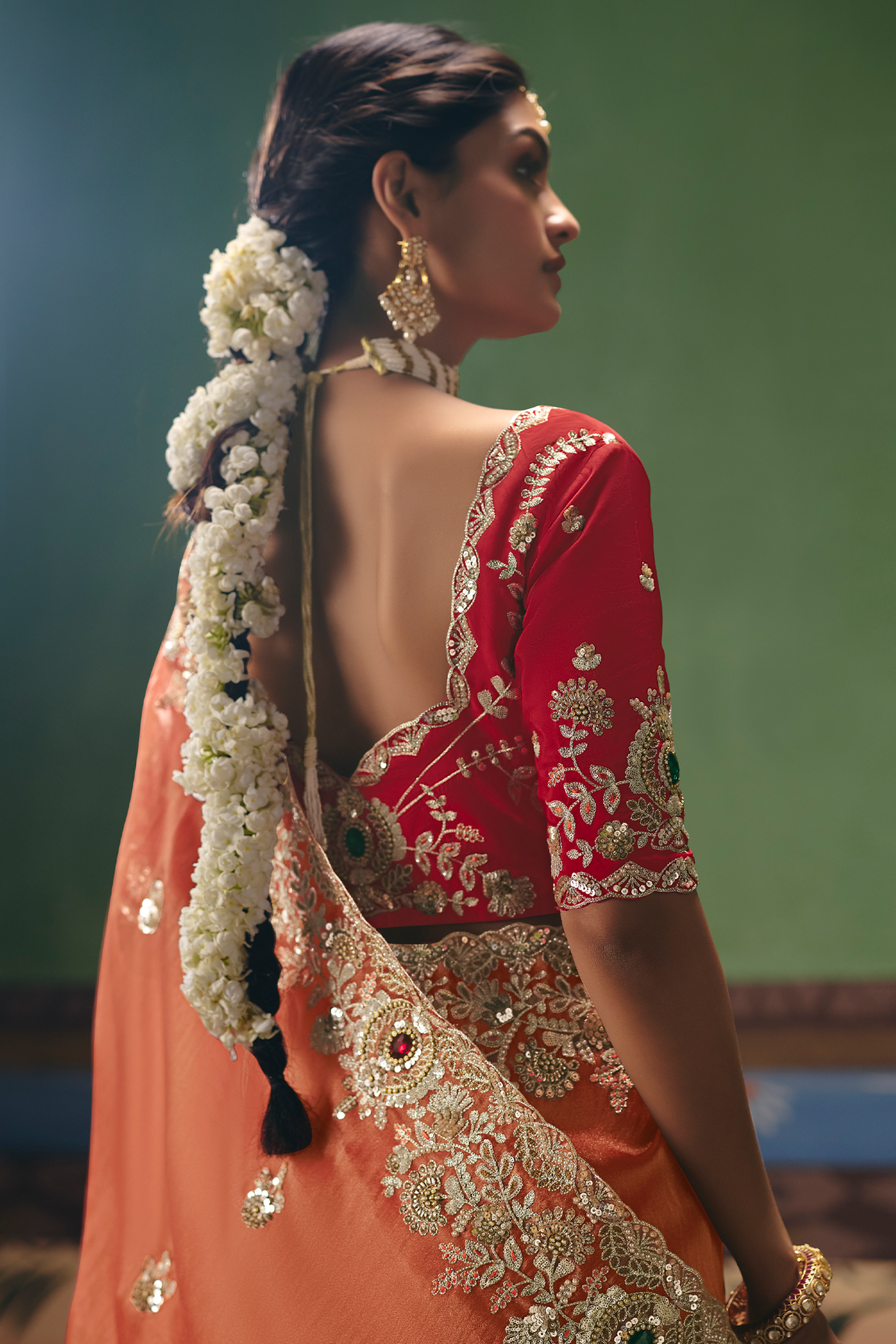 Rust Salmon Saree Highlighting Rich Floral Border Work