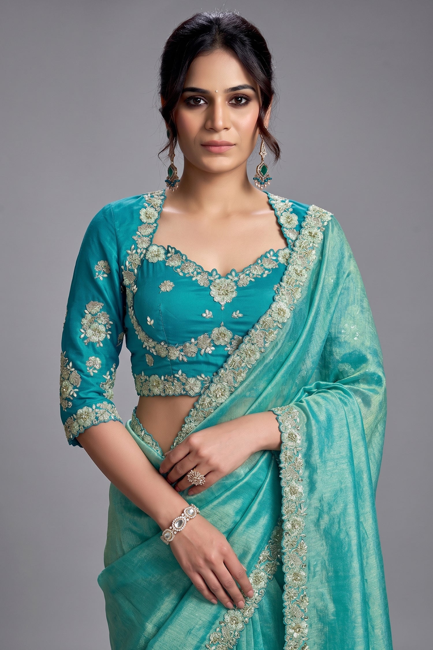 Turquoise Blue Zari Organza Satin Saree Showcasing Applique Flowers Secondary image