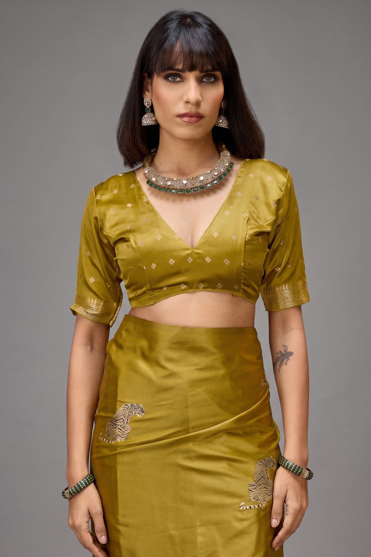 Muted Sage Green Satin Silk Saree with Metallic Tiger Weaves And Geometric Zari Border